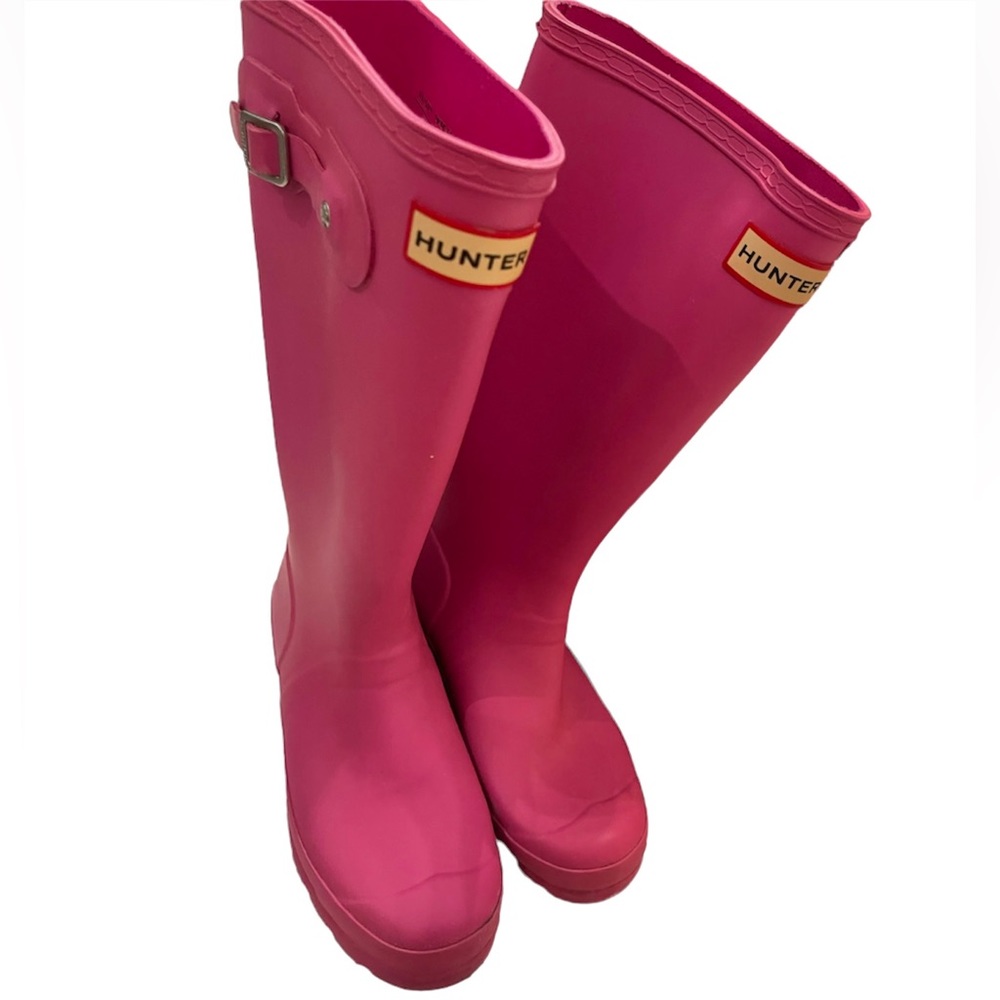 Tall pink Hunter boots